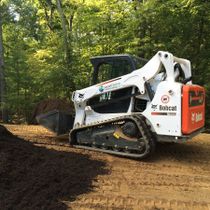 Photo of landscaping vehicles